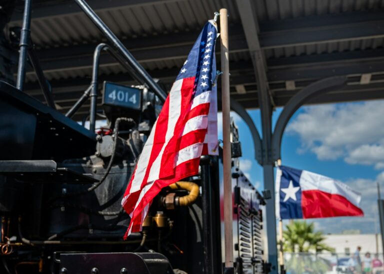 Tractor with an American flag in an agricultural setting