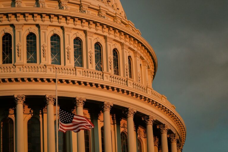 United States Capitol with an American flag in Washington, D.C.