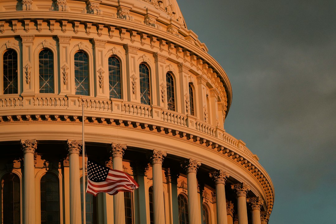United States Capitol with an American flag in Washington, D.C.